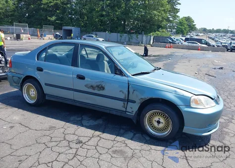 2000 Honda Civic Lx z USA, uszkodzony, nr VIN 1HGEJ6677YL059939